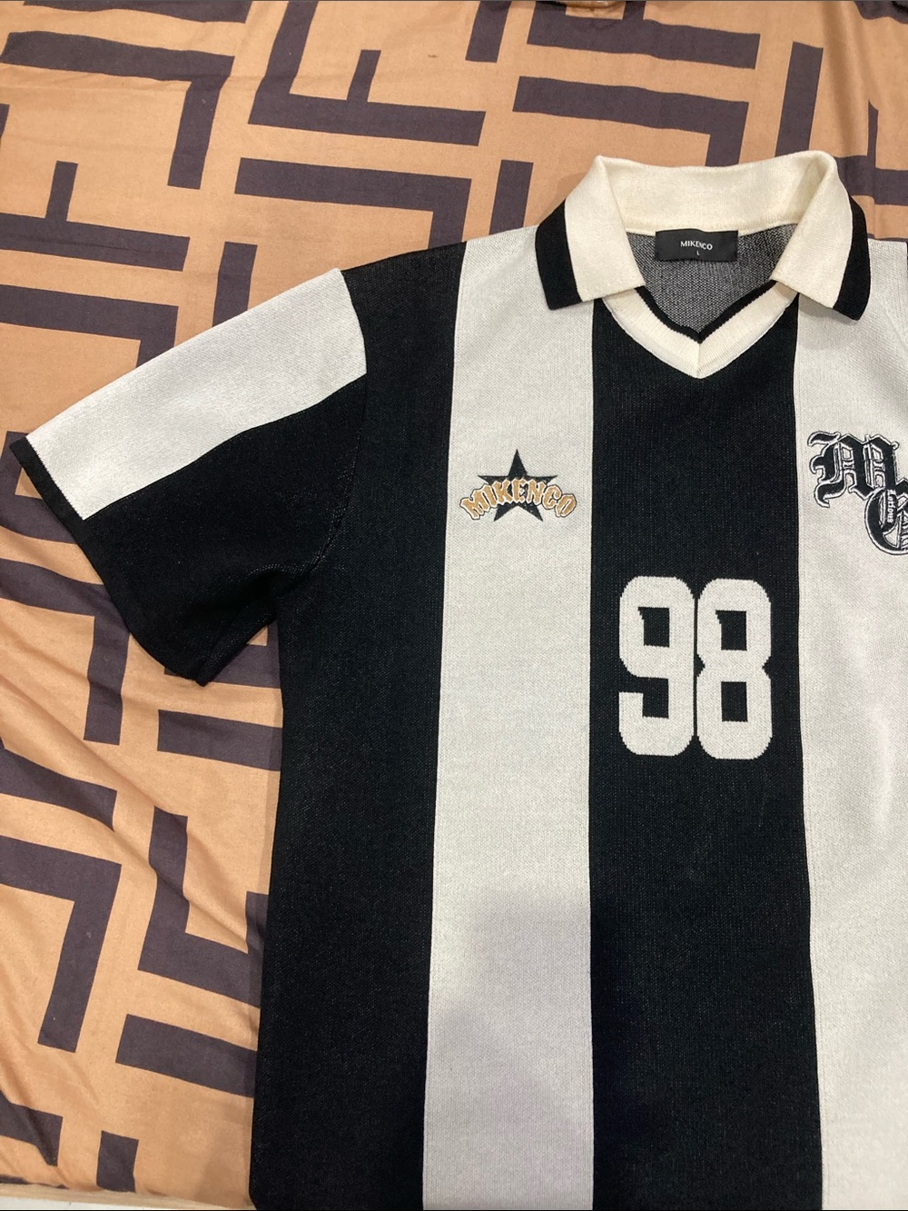 Men's Black & White Striped Polo Shirt - 98 Graphic